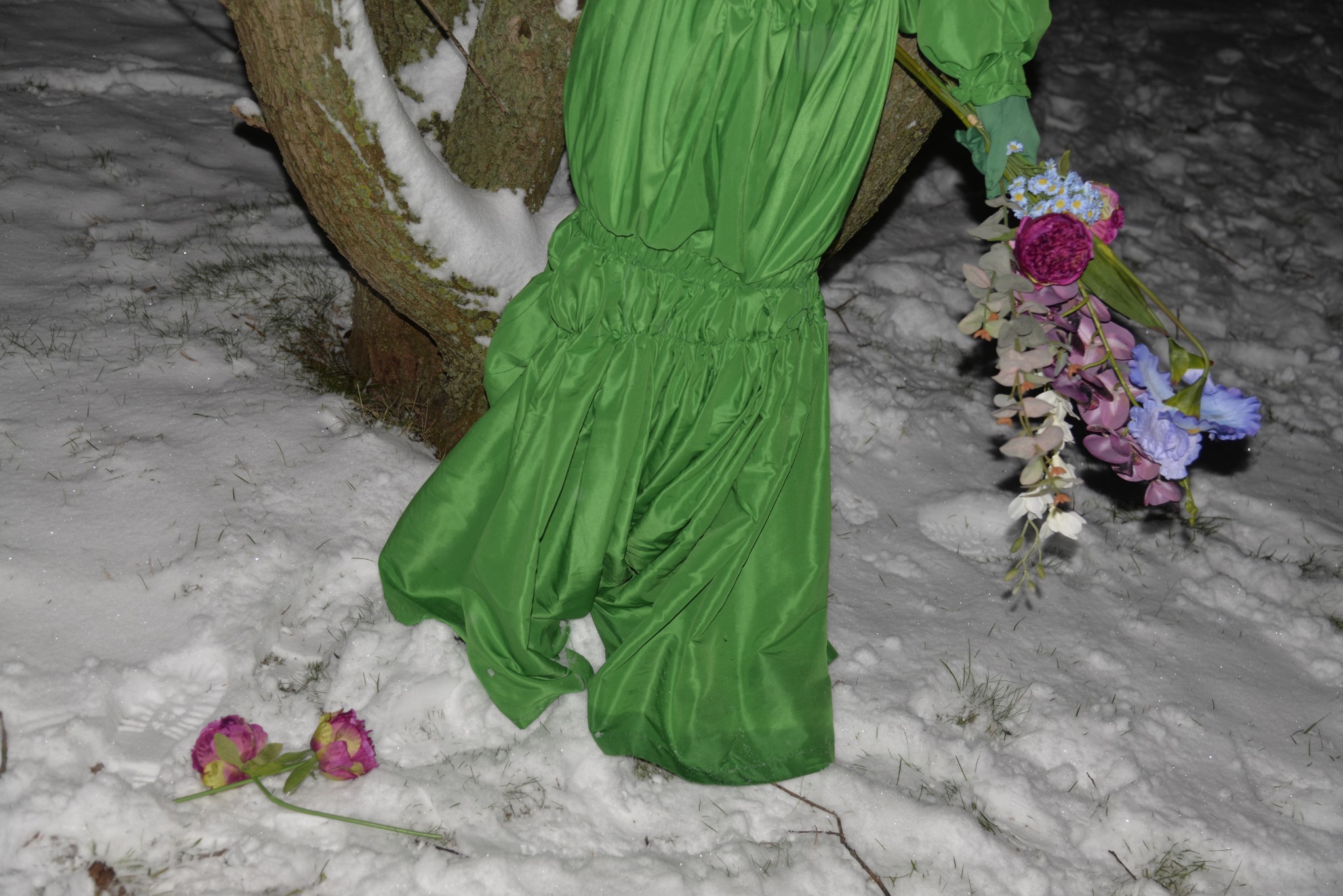 Flower goddess arranging flowers in the snow