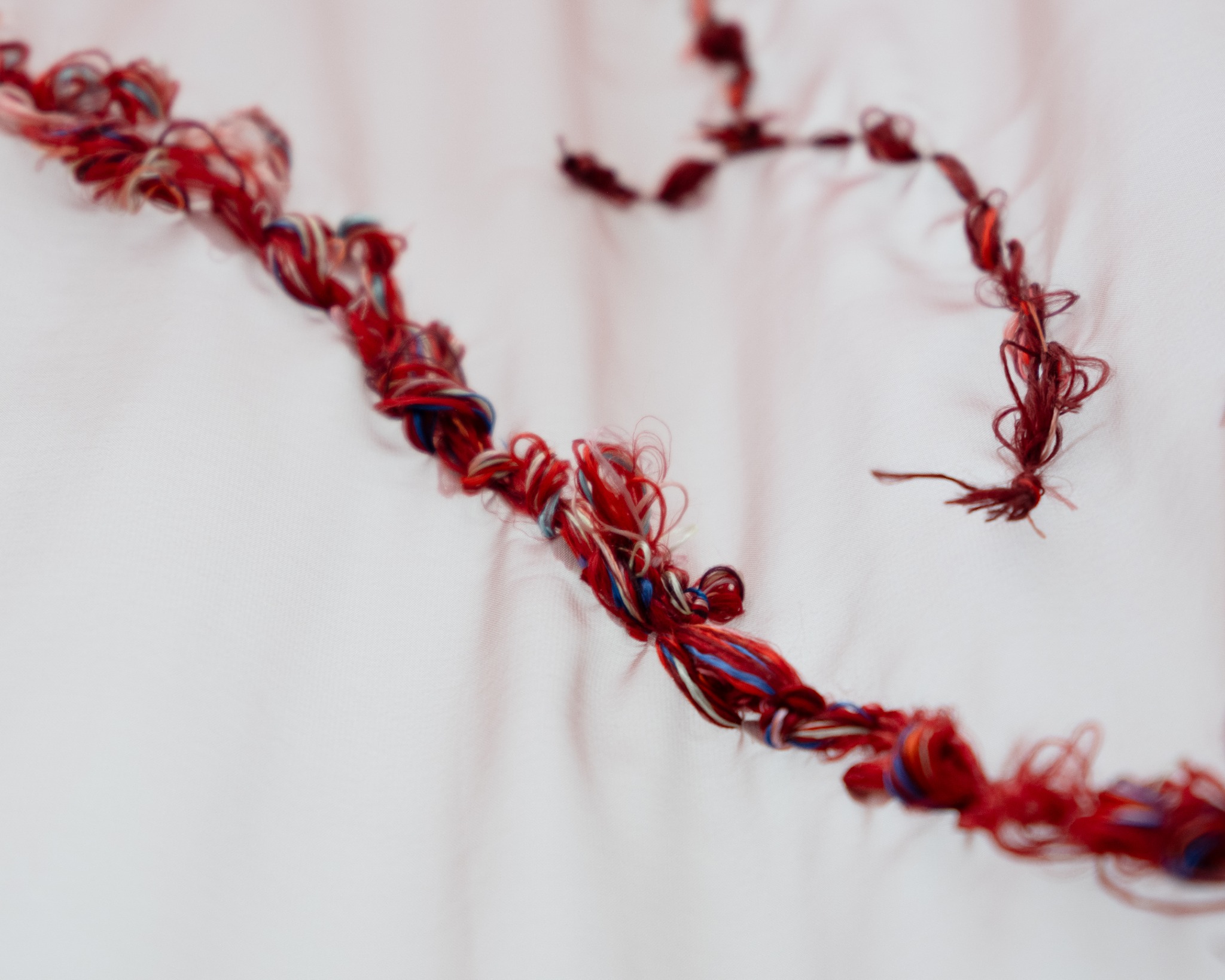 Layered mulberry silk threads on organza